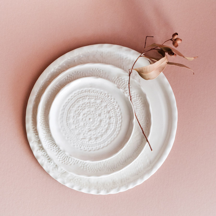 Handmade plates and platters with vintage lace doily imprint by Kim Wallace Ceramics. Handmade by our small creative team in Noosaville Australia