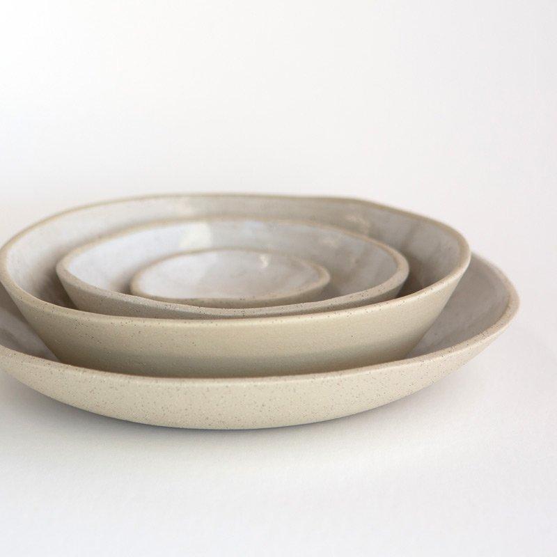 Handmade organic shaped stoneware and porcelain ceramic bowls by Kim Wallace Ceramics, Sunshine Coast Australia