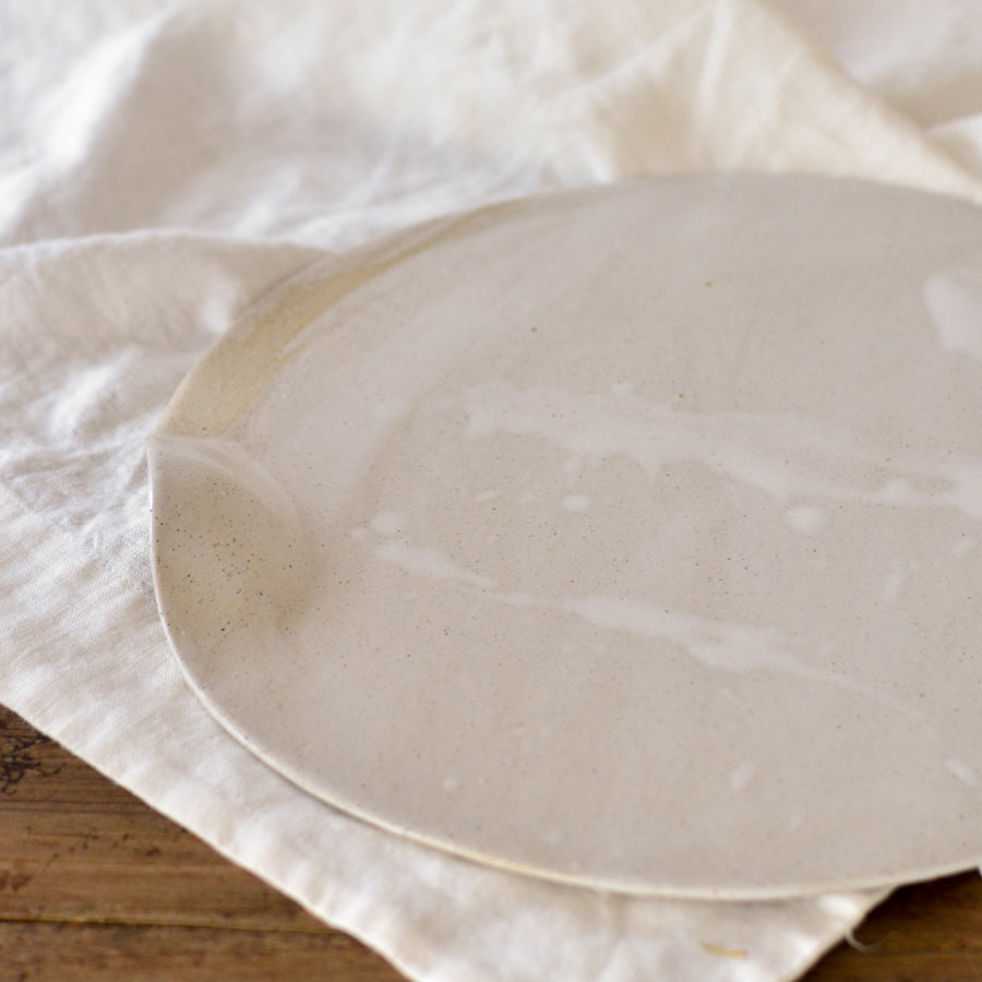 Handmade ceramic stoneware cheese board platter in natural organic shape