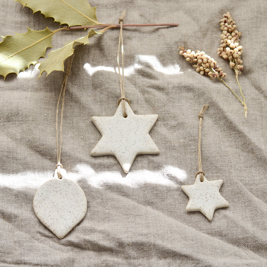 Handmade ceramic Christmas star and bauble ornaments and decorations in speckled white by Kim Wallace Ceramics Australia