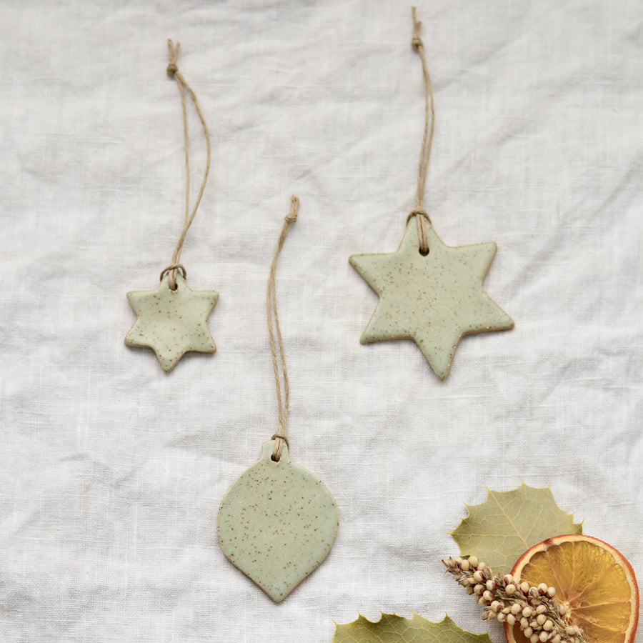 Handmade ceramic Christmas star and baubles ornaments in soft speckled green colour by Kim Wallace Ceramics Australia