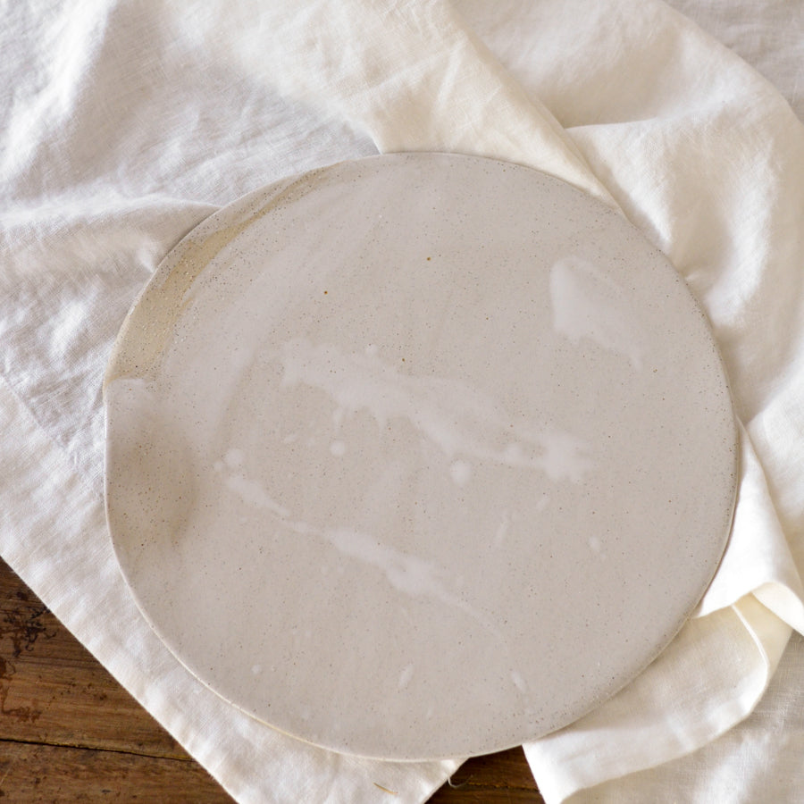 Handmade ceramic stoneware cheese board platter in natural organic shape